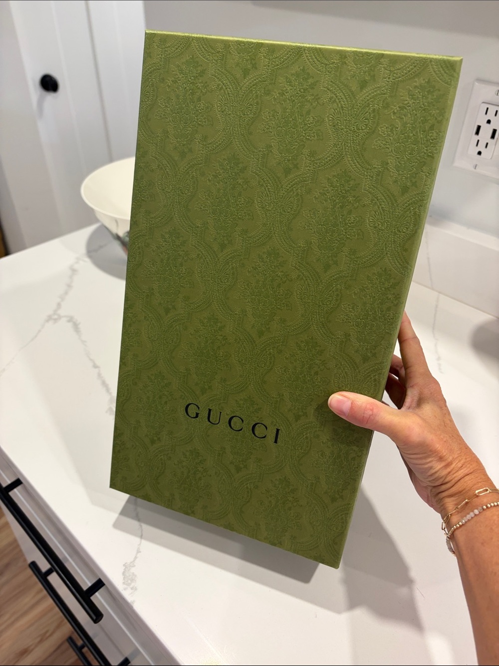 Gucci box likely containing accessory